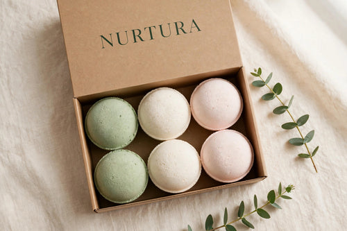 NURTURA-branded gift box of pastel bath bombs