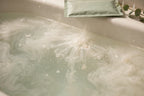 Bath soak salts dissolving in warm bath water