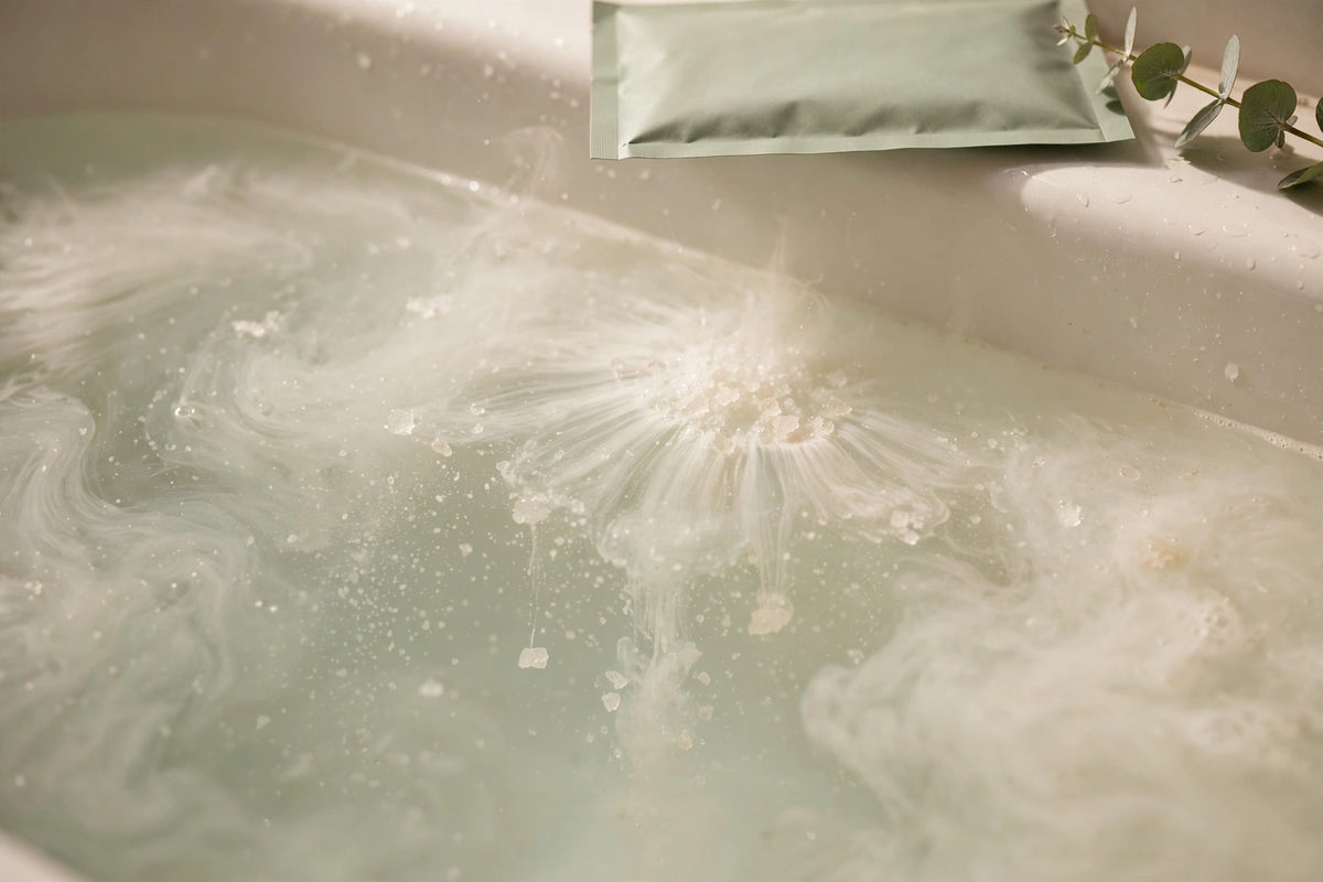 Bath soak salts dissolving in warm bath water
