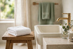 Nurtura Disposable Face Towels — bathroom setting with folded towel
