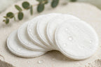 Close-up of soft white Nurtura toner pads showing texture
