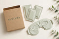 Nurtura Self-Heating Steam Eye Masks — NURTURA-branded box with sachets and an unfolded mask